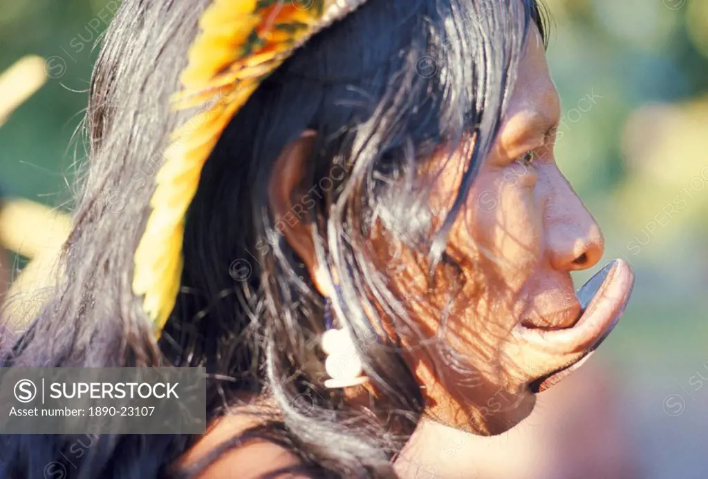Portrait of a Suya Indian with lip plate, Brazil, South America 1971