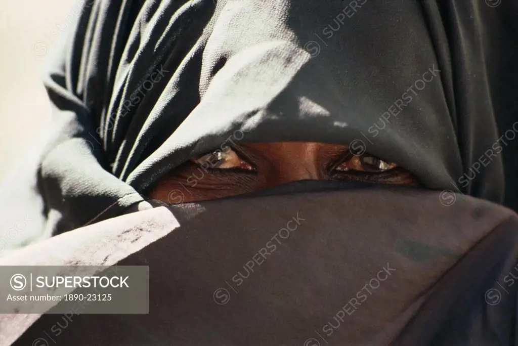 Veiled woman, Lamu, Kenya, East Africa, Africa