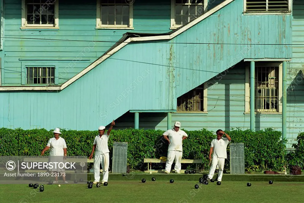 Men and women on a bowling green in Apia on the island of Upolu in Western Samoa, Pacific