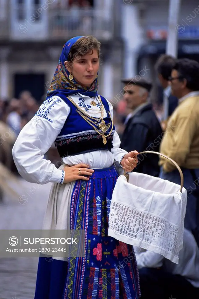 Young woman in folk dress, New Fairs, Ponte de Lima, Minho, Portugal, Europe