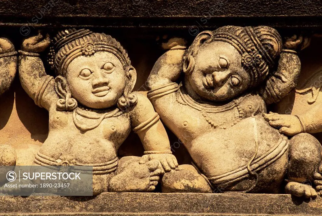 Dwarves line temple wall, Kelaniya temple, near Colombo, Sri Lanka, Asia