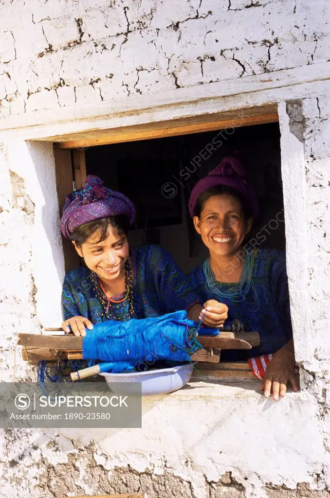 Mother and daughter in traditional dress, Santa Catarina Palopo, Guatemala, Central America