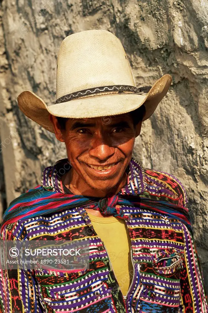 Portrait of a man in traditional hat and dress, Santa Catarina Palopo, Guatemala, Central America