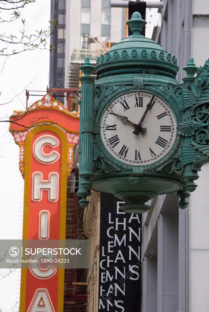 The Marshall Field Building Clock and Chicago Theatre behind, Chicago, Illinois, United States of America, North America