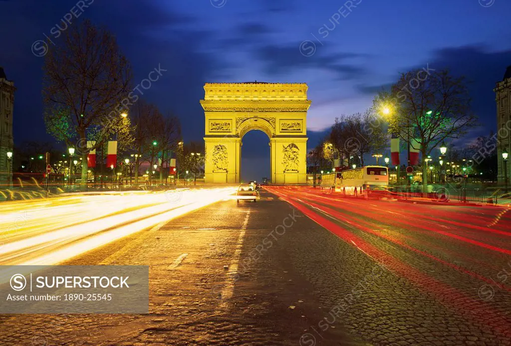 Arc de Triomphe illuminated at dusk, Paris, France, Europe