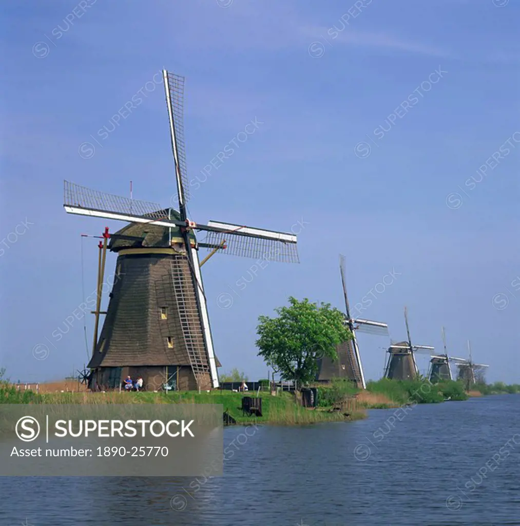 Windmills on the canal at Kinderdijk near Rotterdam, UNESCO World Heritage Site, The Netherlands, Europe