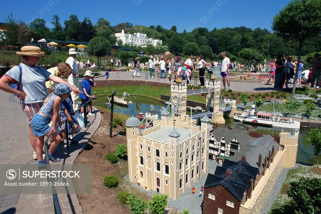 People admiring models of the Tower of London and Tower Bridge, Legoland amusement park, Windsor, Berkshire, England, United Kingdom, Europe