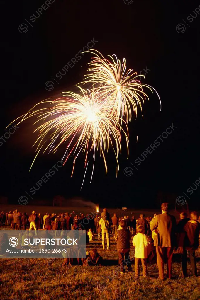 Crowd watching fireworks display, United Kingdom, Europe