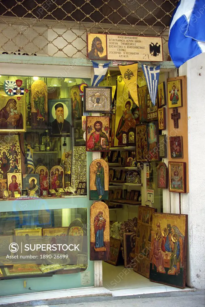 Icons, paintings and religious artefacts for sale in a shop in the Plaka district of Athens, Greece, Europe