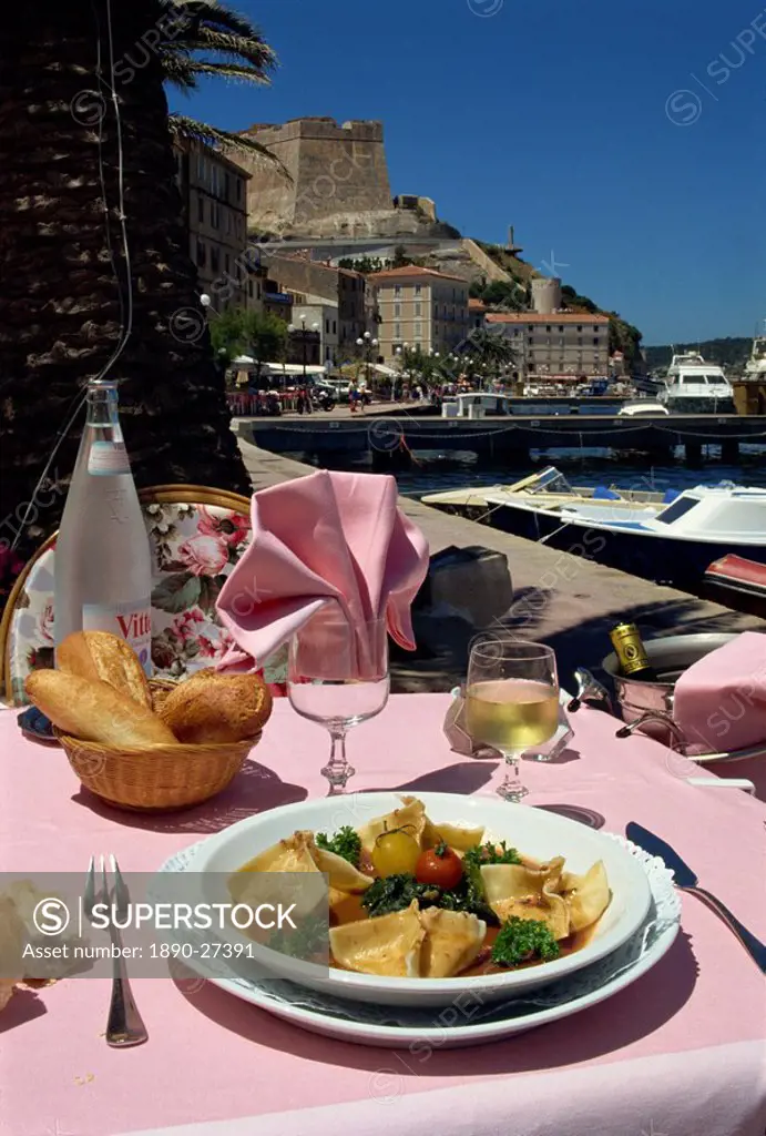 Meal on an outdoor table of the La Caravelle Restaurant, Bonifacio, Corsica, France, Europe