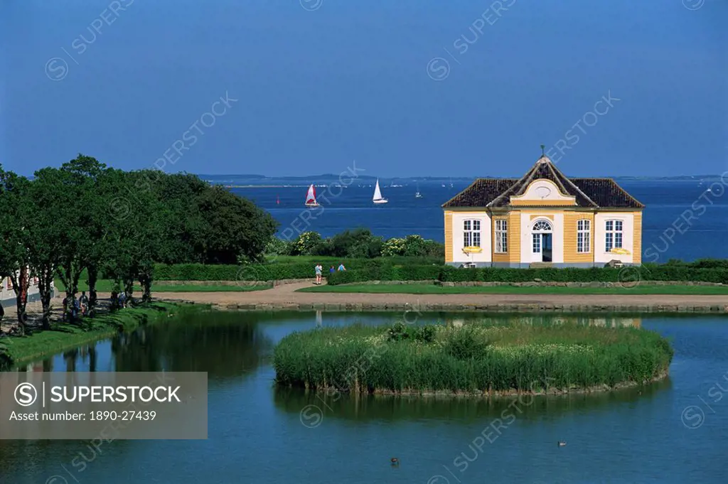 Lake and building by the coast, Valdemar Slot, Denmark, Scandinavia, Europe