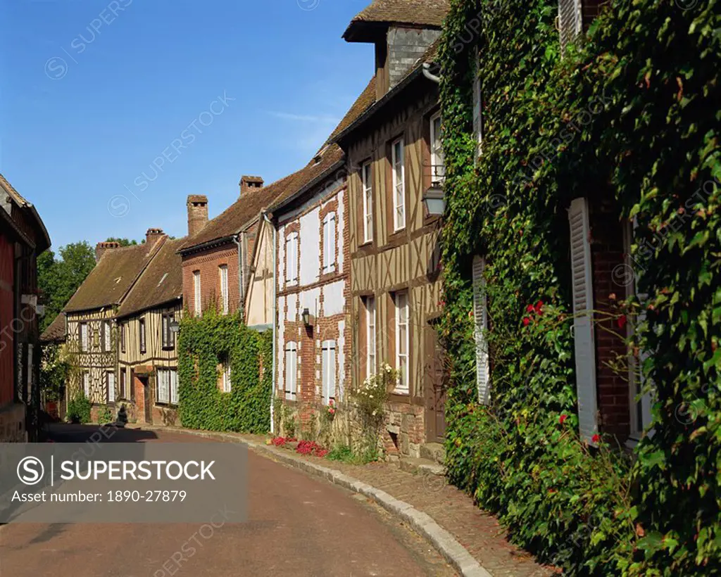 Houses line a quiet street at Gerberoy in Picardie, France, Europe
