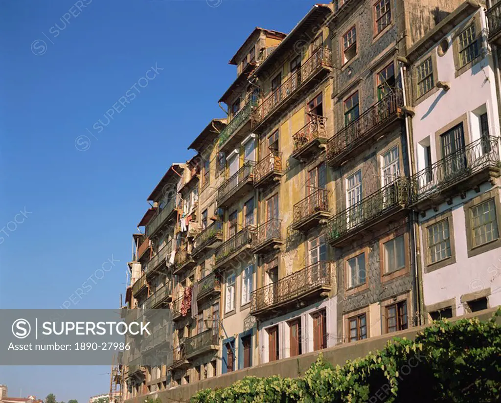 Balconies on the facades of old buildings in the city of Oporto, Portugal, Europe