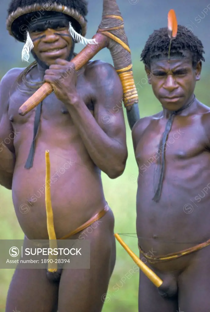 Portrait of two Dani tribesmen wearing penis gourds, Irian Jaya West Irian Irian Barat, New Guinea, Indonesia, Asia