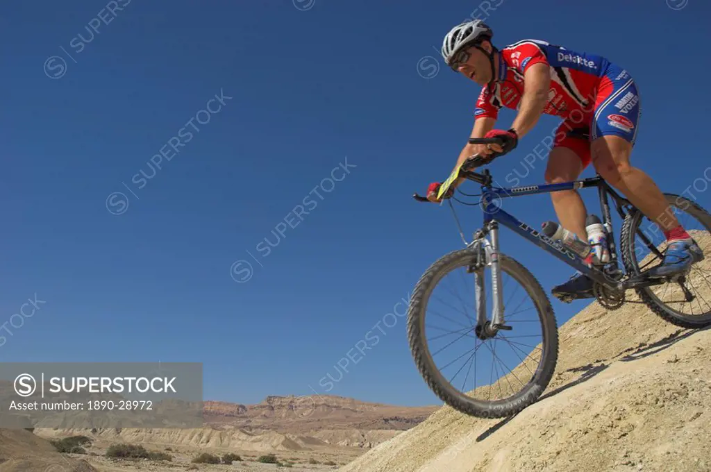 Competitior riding downhill in the Mount Sodom International Mountain Bike Race, Dead Sea area, Israel, Middle East