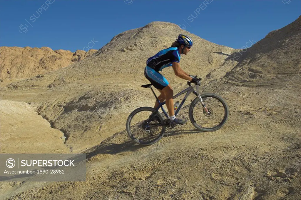 Side view of competitior in the Mount Sodom International Mountain Bike Race, Dead Sea area, Israel, Middle East