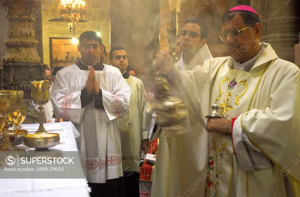 Monseigneur Fouad Boutros Tawal, Coadjutor of the Latin Patriarch of Jerusalem, swinging incense during Mass in Easter week, Church of the Holy Sepulc...