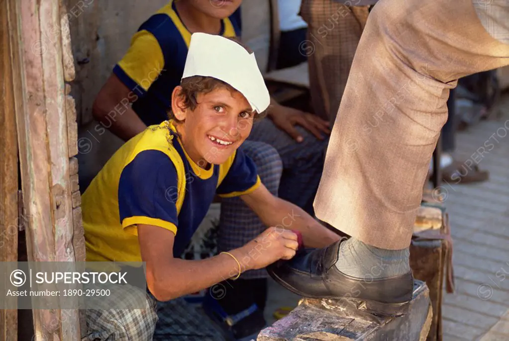 Portrait of a smiling shoeshine boy in downtown Van in Kurdistan, Turkey, Asia Minor, Eurasia