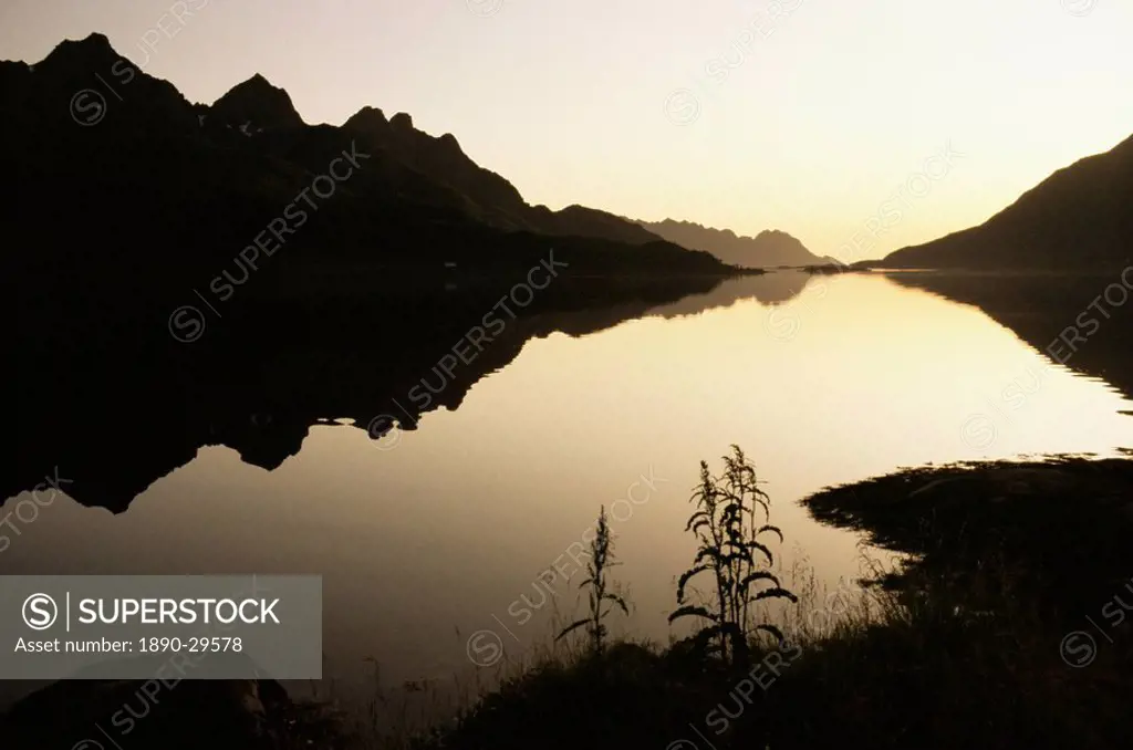 Midnight sun and calm reflections, Lofoten Islands, Arctic, Norway, Scandinavia, Europe