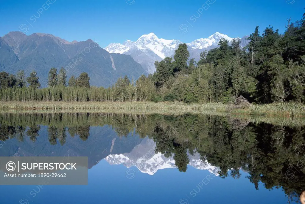 Perfect reflection on Lake Matheson, Fox Glacier, Westland, South Island, New Zealand, Pacific