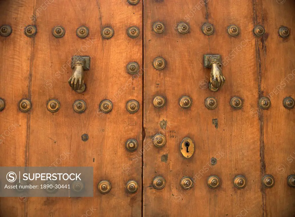 Detail of old door with hand of Fatima doorknockers, Ronda, Andalucia, Spain, Europe