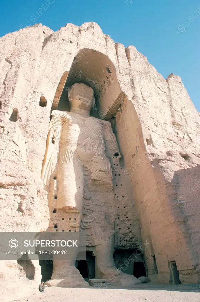 Defaced statue of the Buddha, 55m tall, carved in cliff by monks, since destroyed by the Taliban, UNESCO World Heritage Site, Bamiyan, Afghanistan, As...