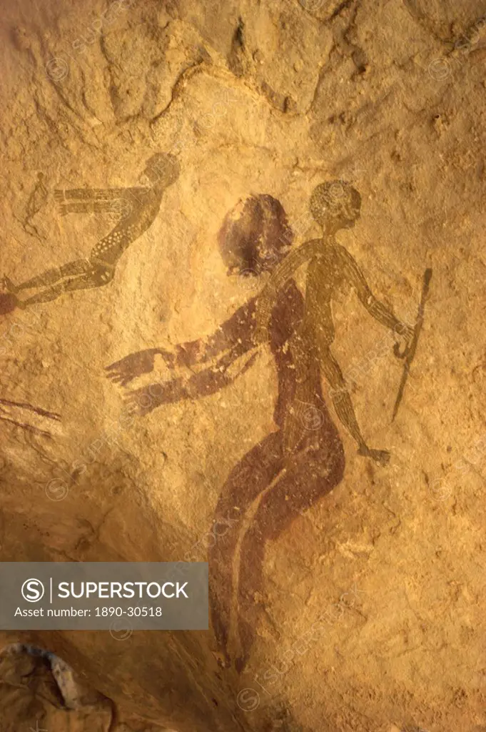 Rock paintings of decorated woman and children on cave, Tassili n´Ajjer, UNESCO World Heritage Site, Algeria, North Africa, Africa