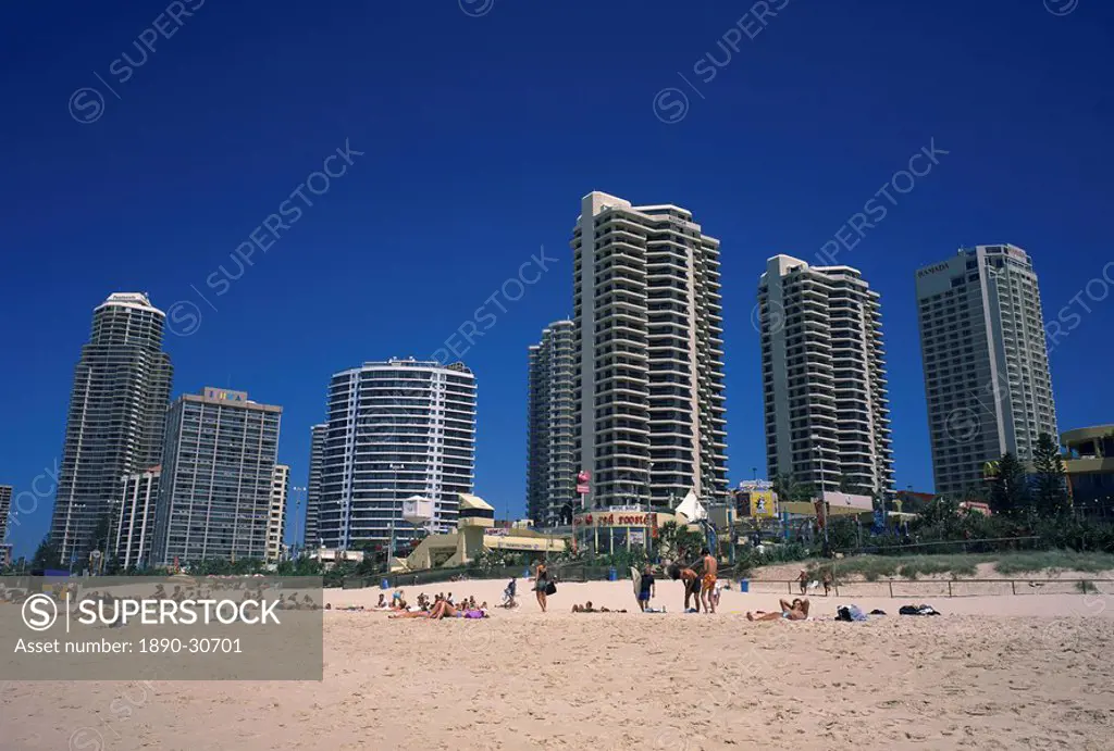 The beach, central shopping mall and restaurants, with skyline of apartment blocks behind, at Surfers Paradise, Gold Coast, Queensland, Australia, Pac...