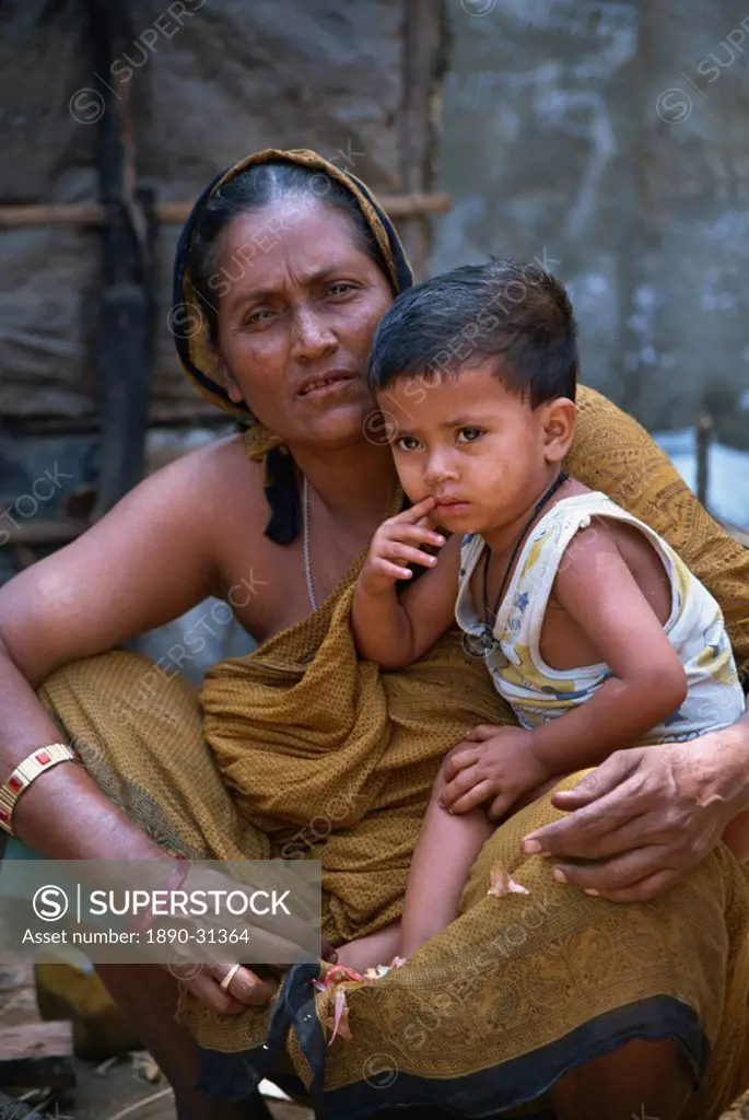 Mother and son in a slum in Dhaka, Bangladesh, Asia