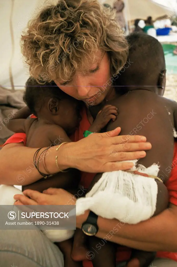 Italian nurse in orphanage, Goma, Zaire, Africa