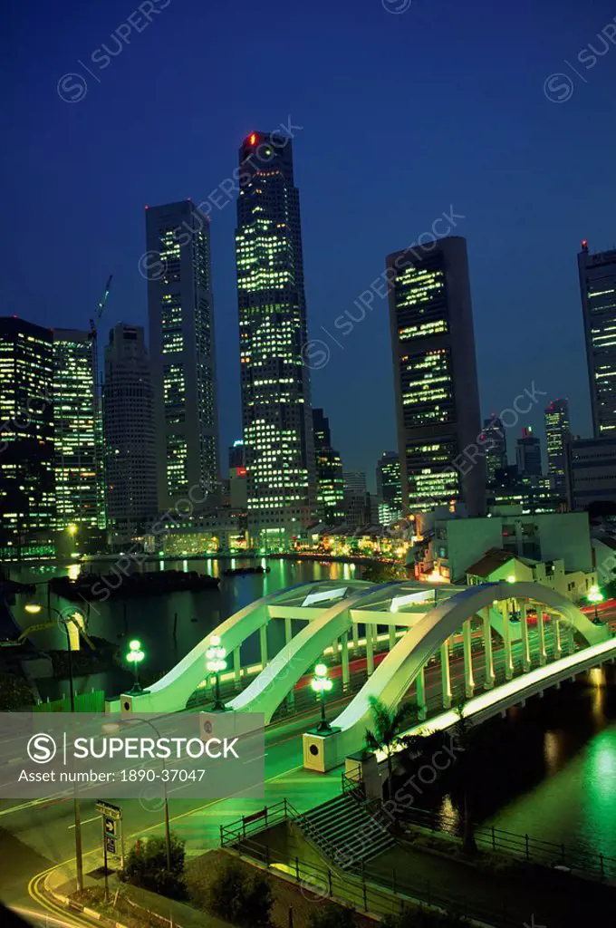 The Elgin Bridge and skyscrapers of the financial district illuminated at night in Singapore, Southeast Asia, Asia