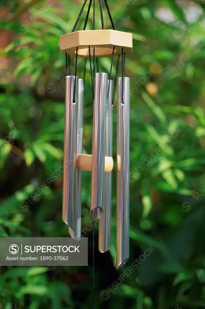 Metal wind chimes hanging outside