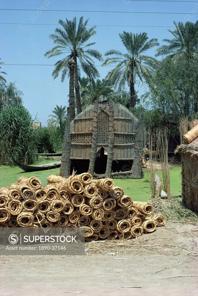 Mudhif´ meeting house and reed mats ready for sale, Chobaish Marshes, Iraq, Middle East