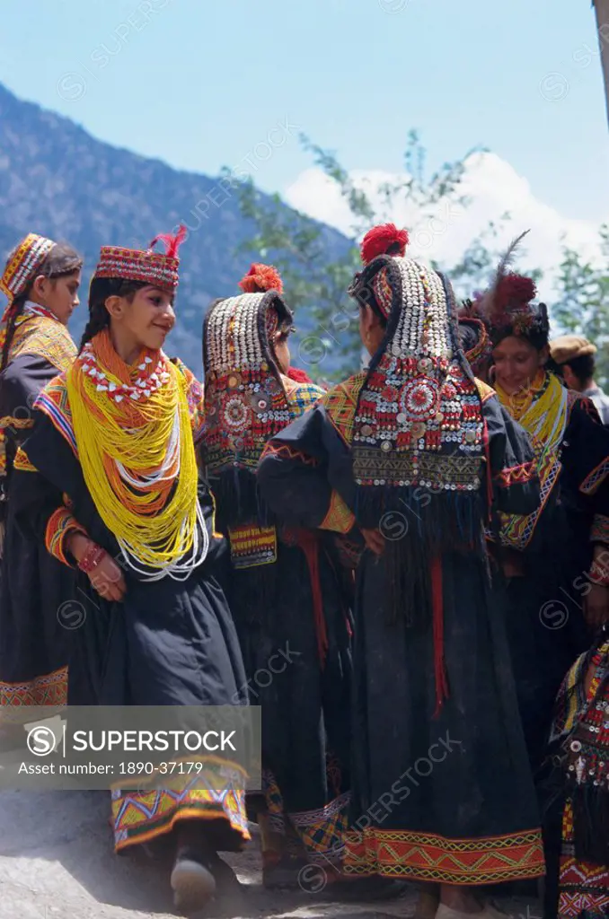 Group of Kalash women in traditional dress, Bumburet village, Chitral Valley, Pakistan, Asia