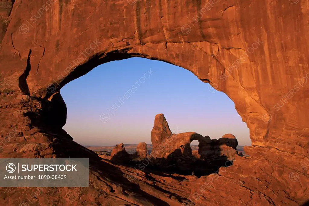 Sunrise, Turret Arch seen through North Window, Arches National Park, Utah, United States of America, North America