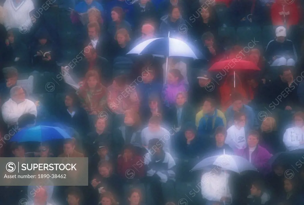 Diffuser filter used on shot of Wimbledon crowd in the rain, London, England, United Kingdom, Europe