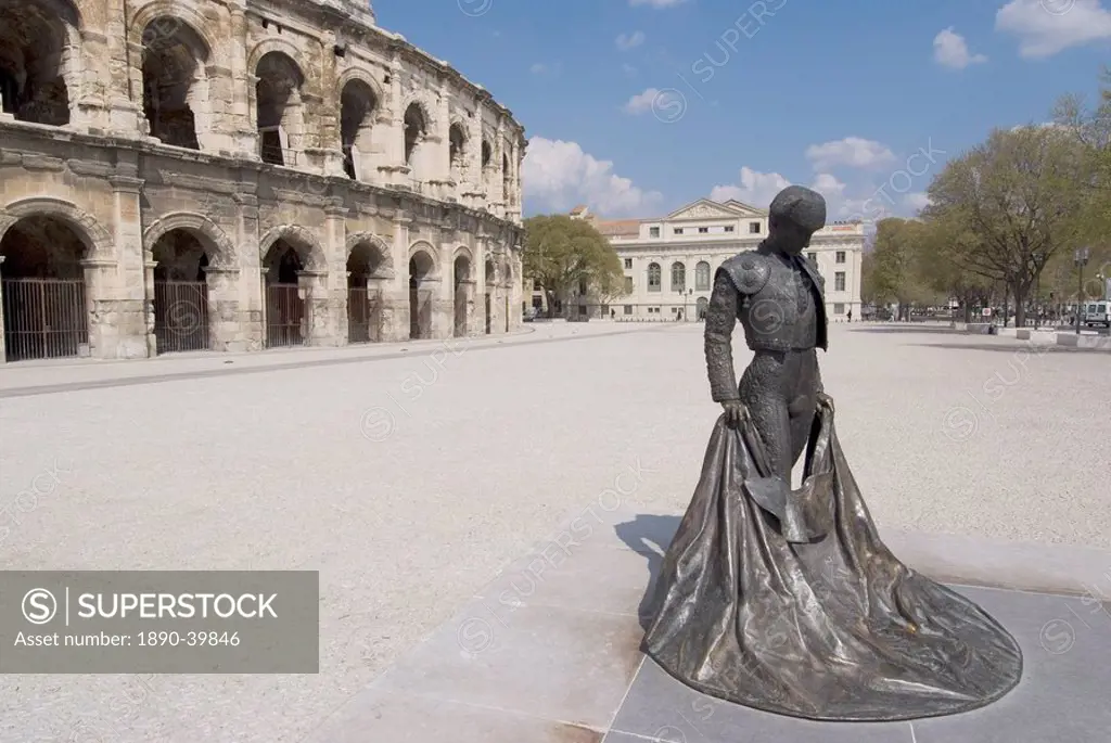 Roman arena with bullfighter statue, Nimes, Languedoc, France, Europe