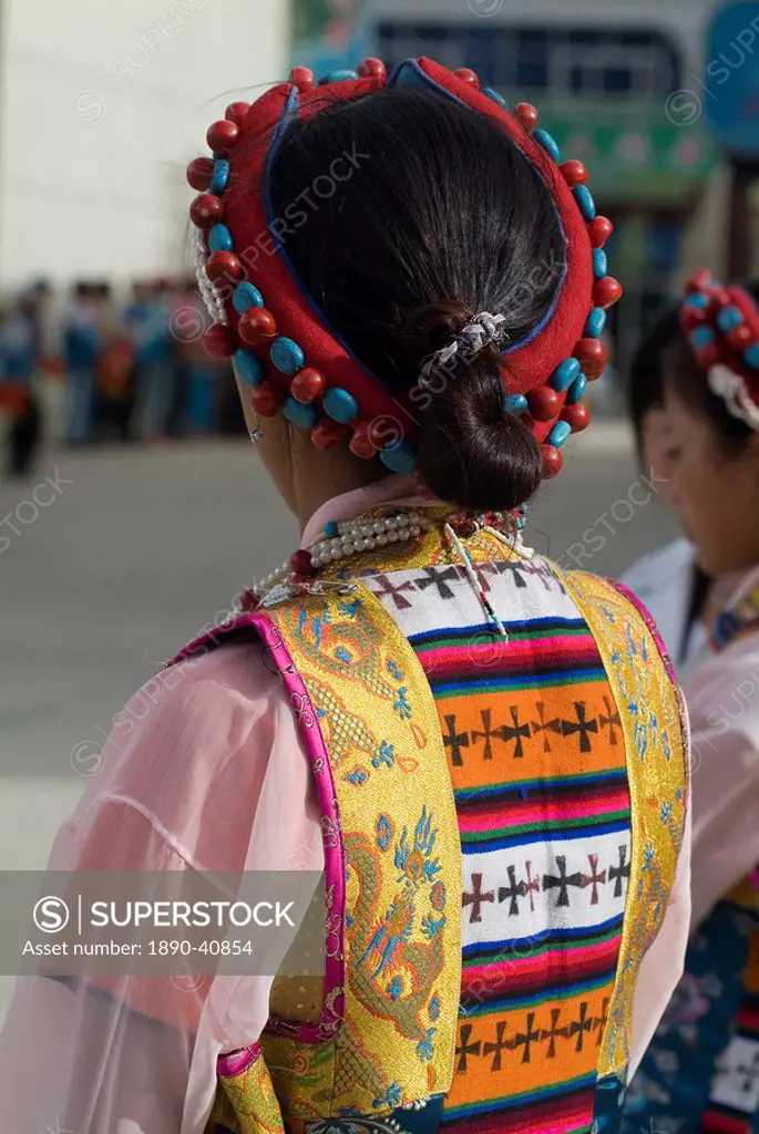 Dancer in traditional dress, Gyantse, Tibet, China, Asia