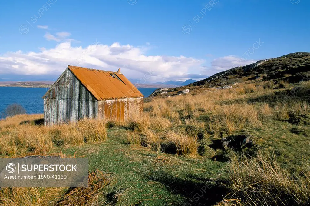 Hut with rusty corrugated roof, Loch Ewe, Wester Ross, Highland region, Scotland, United Kingdom, Europe