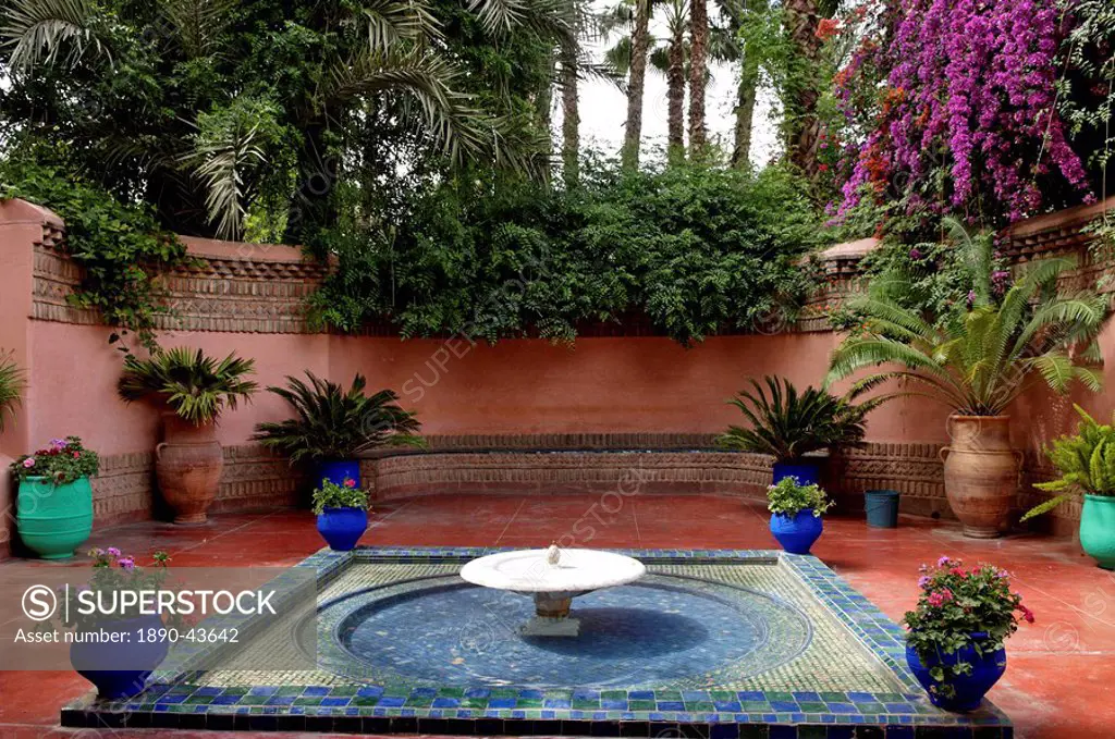 Fountain in the Majorelle Garden, created by the French cabinetmaker Louis Majorelle, and restored by the couturier Yves Saint_Laurent, Marrakesh, Mor...
