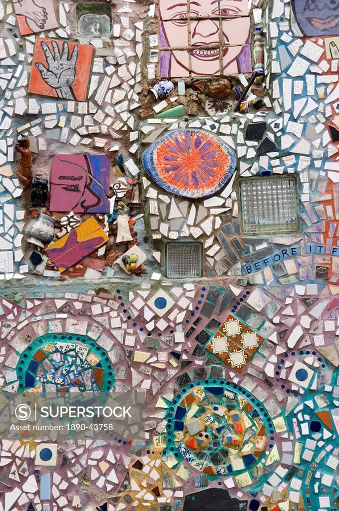 Decoration of patterns in glass, mirrors, ceramics and other fragments of objects embedded in stucco by sculptor Isaiah Zagar, South Street, Philadelp...