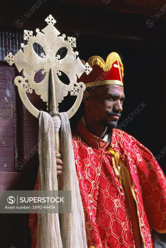 Portrait of a man holding a Christian symbol, Bieta Golgotha, Lalibela, Wollo region, Ethiopia, Africa