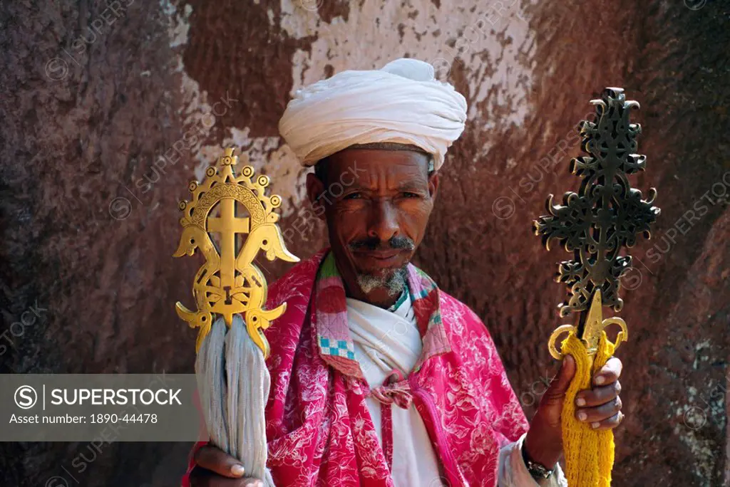 Portrait of a man holding Christian symbols, Gabriel and Raphael, Bieta Mercurios, Lalibela, Wollo region, Ethiopia, Africa