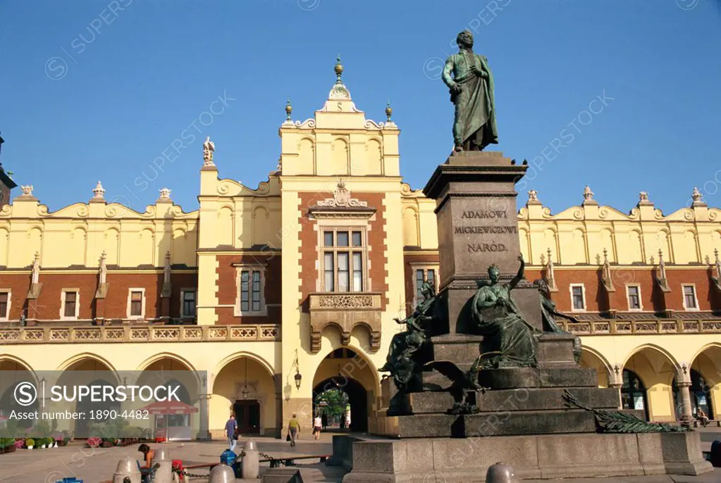 Statue of Adam Mickiewicz in front of the Cloth Hall on the Main Square in Krakow, Malopolska, Poland, Europe