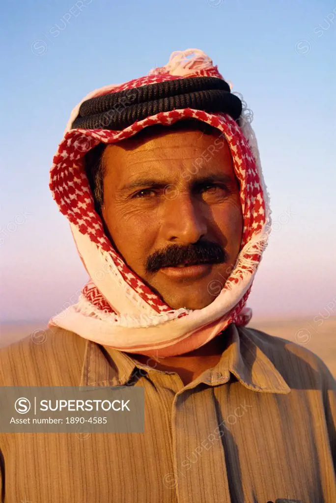Portrait of camel driver with moustache and traditional headcloth, Jordan, Middle East