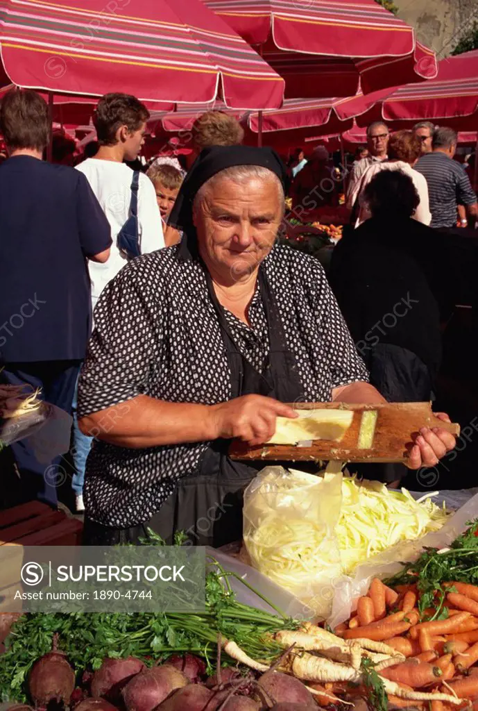 Lady grating cabbage, Dolac market, Zagreb, Croatia, Europe