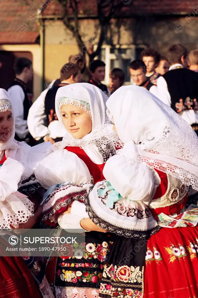 Two girls dancing in traditional dress, Dress Feast with Wreath and Duck Festival, village of Skoronice, Moravian Slovacko folk region, Skoronice, Brn...