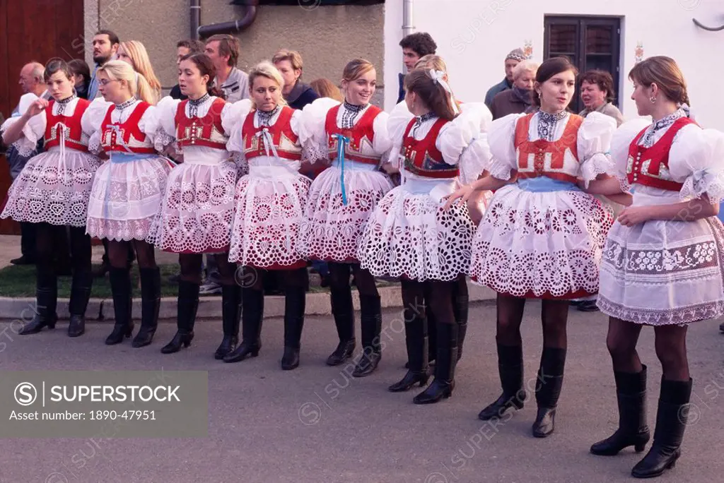 Girls in traditional dress lined up during ceremony, Dress Feast with Wreath and Duck Festival, village of Skoronice, Moravian Slovacko folk region, S...