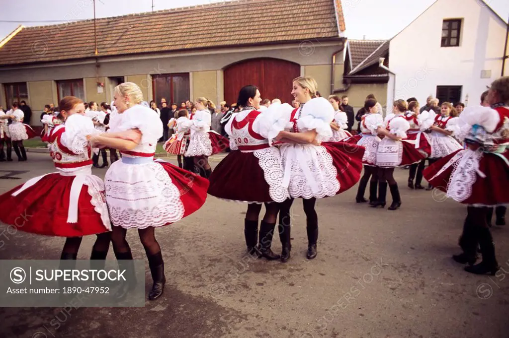Girls dancing in traditional dress, Dress Feast with Wreath and Duck Festival, village of Skoronice, Moravian Slovacko folk region, Skoronice, Brnensk...