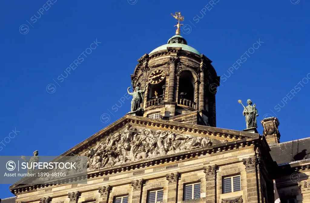 Detail of the decoration of the upper part and clock tower of the Royal Palace, Amsterdam, The Netherlands Holland, Europe